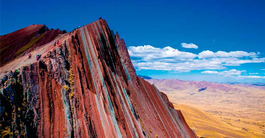 Pallay Poncho Rainbow Mountain in Peru, Auri Peru