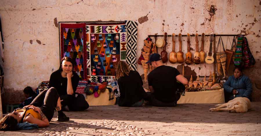 San Blas street market with persons in Cusco, Peru