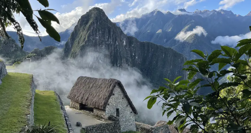 The ruins of Machu Picchu in Peru, featuring the iconic Guardian House amidst stunning mountainous scenery.