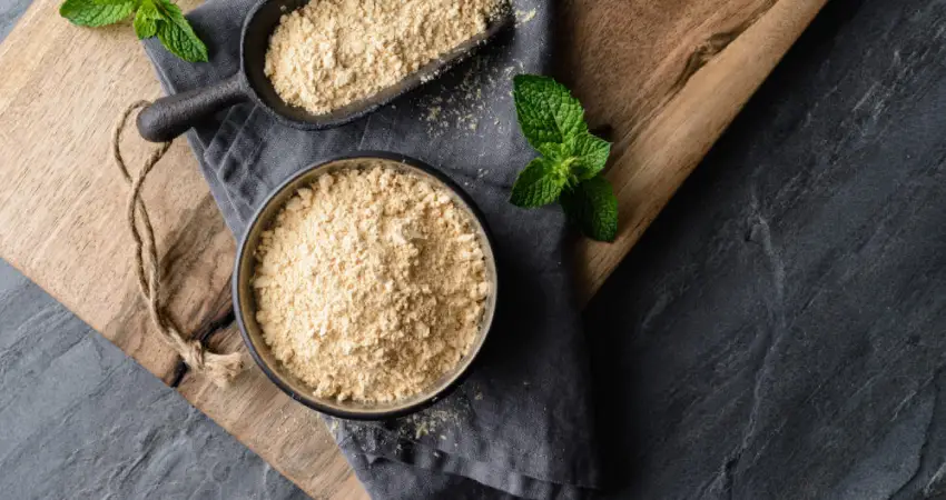 Two bowls of oats on a wooden cutting board, featuring Maca Root from Peru for added nutrition and flavor.